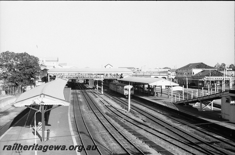 P14031
Station buildings and platforms, Perth Station, overall view from the Barrack Street Bridge looking west.
