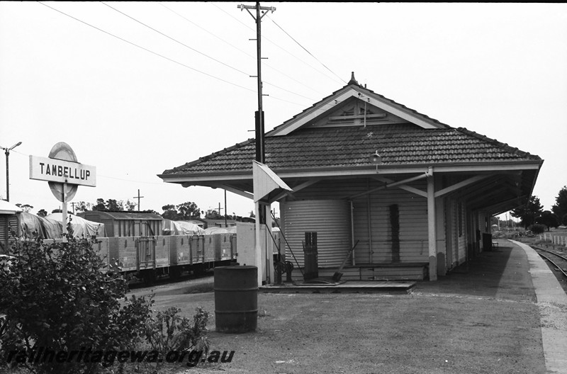 P14047
Station building, lever frame, nameboard, Tambellup, GSR line, end view of building looking along the platform.
