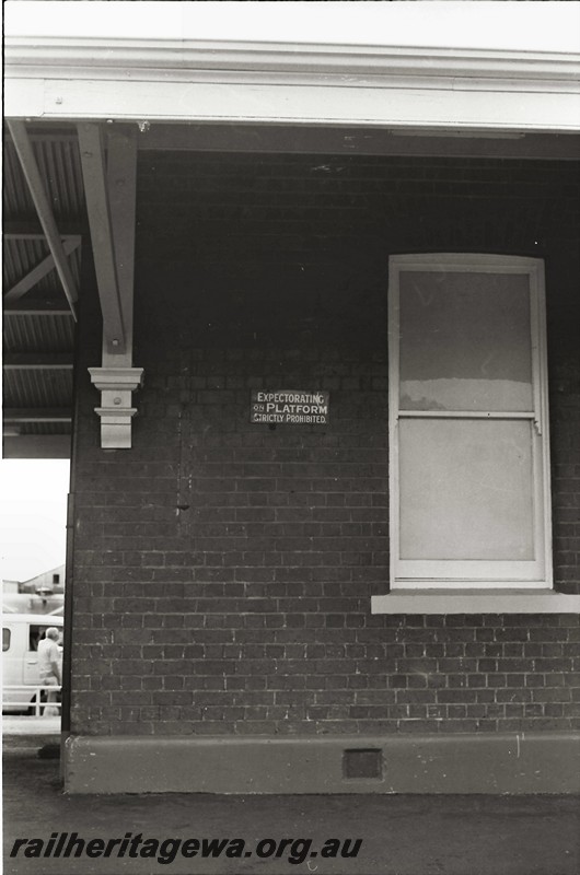 P14051
Station building corner, sign, Expectorating on Platform Strictly Prohibited, Wagin, GSR line.
