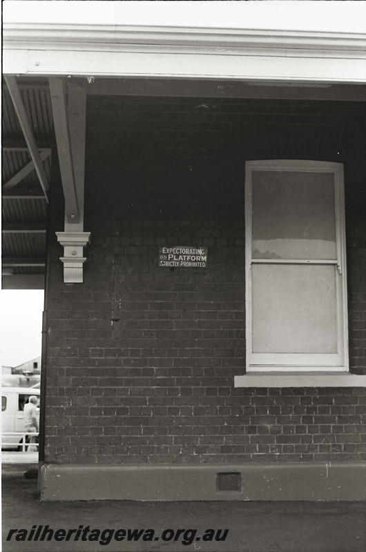 P14051
Station building corner, sign, Expectorating on Platform Strictly Prohibited, Wagin, GSR line.
