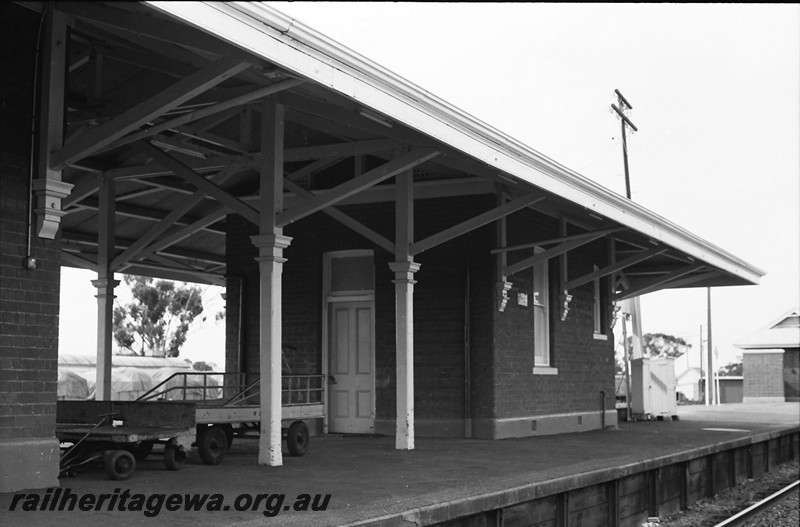 P14052
Station building southern end, platform trolley, Wagin, GSR line.
