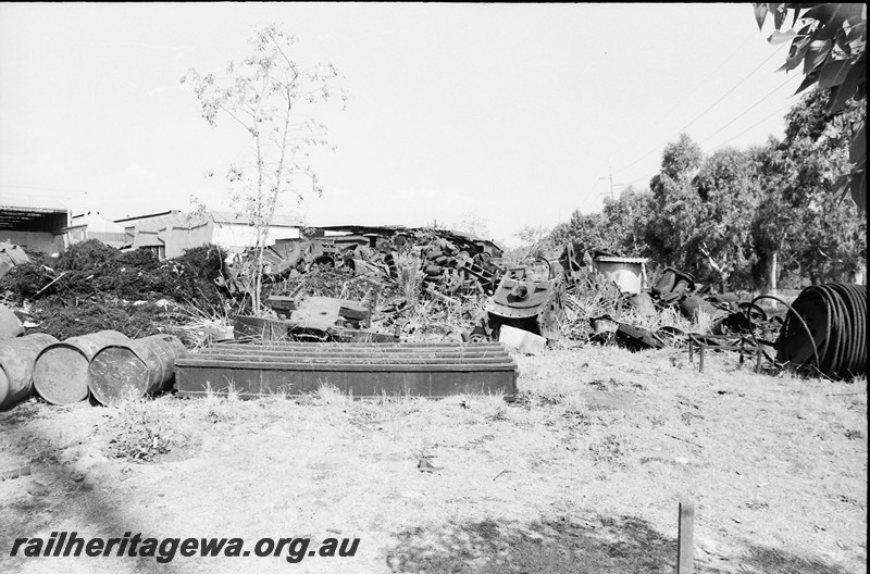 P14080
3 of 3 Remnants of locos and rolling stock at the salvage yard Midland Workshops. 
