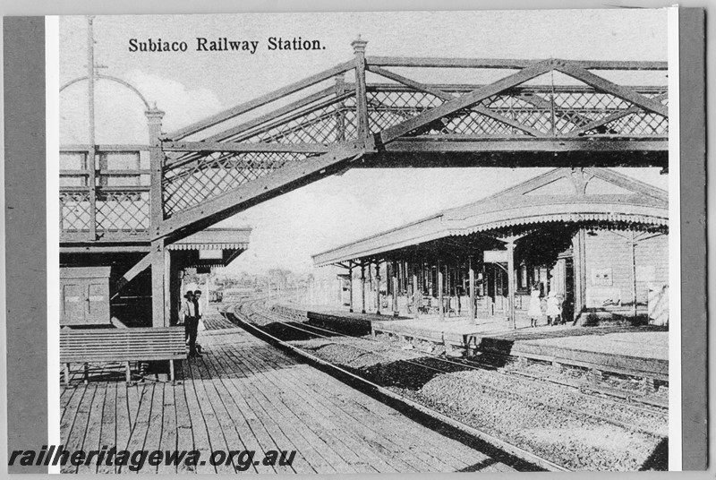 P14091
Station buildings with planked platform, foot bridge, Subiaco, view looking along the track towards Perth

