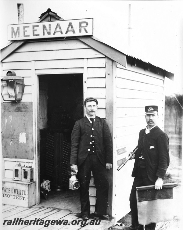 P14115
Station building, nameboard, Meenaar, EGR line, two employees in front of the building, the one on the right is thought to be Mr Henry Cooper, the Officer in Charge, c1901

