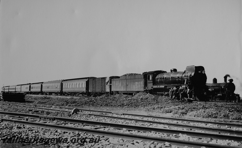 P14125
Commonwealth Railways (CR) C class 63, Zanthus, TAR Line, front and side view, on passenger train.
