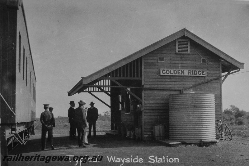 P14145
Station building, Golden Ridge, TAR line end and trackside view, passenger train stopped at the station
