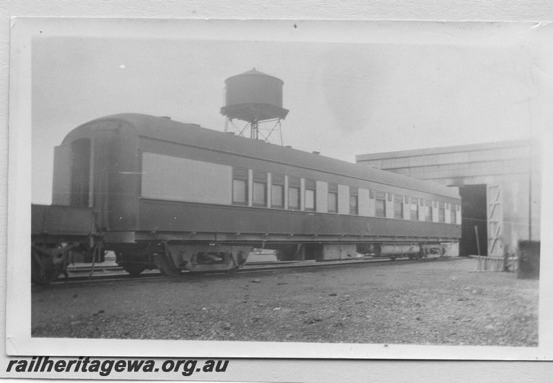 P14181
Commonwealth Railways (CR) standard gauge passenger carriage with wooden sides, end and side view.
