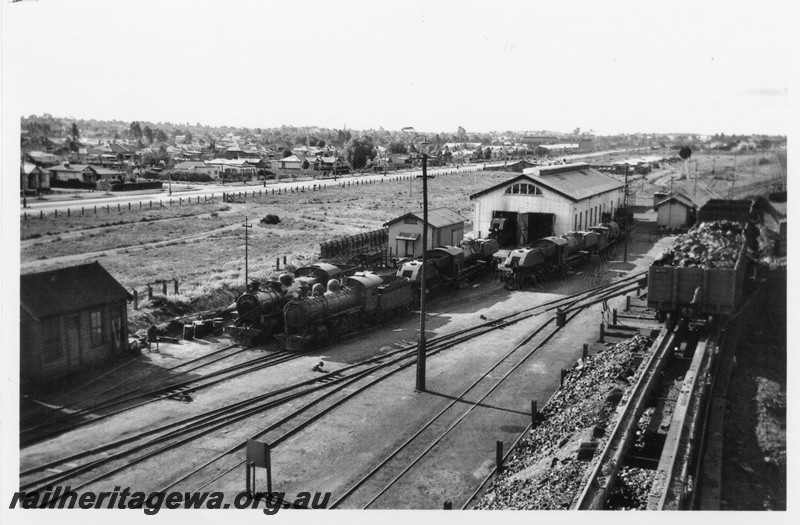 P14205
Loco depot and workshop, wagons on the coal stage, Kalgoorlie loco depot, elevated view taken above the coal stage from the water tower 
