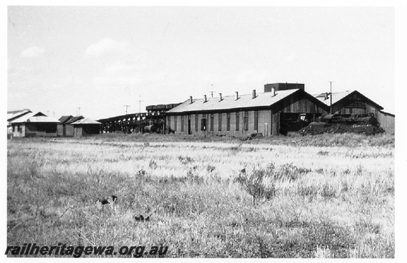 P14208
Loco shed and workshop, part of the coal stage, top of the water tower, Kalgoorlie loco depot, view looking south east.
