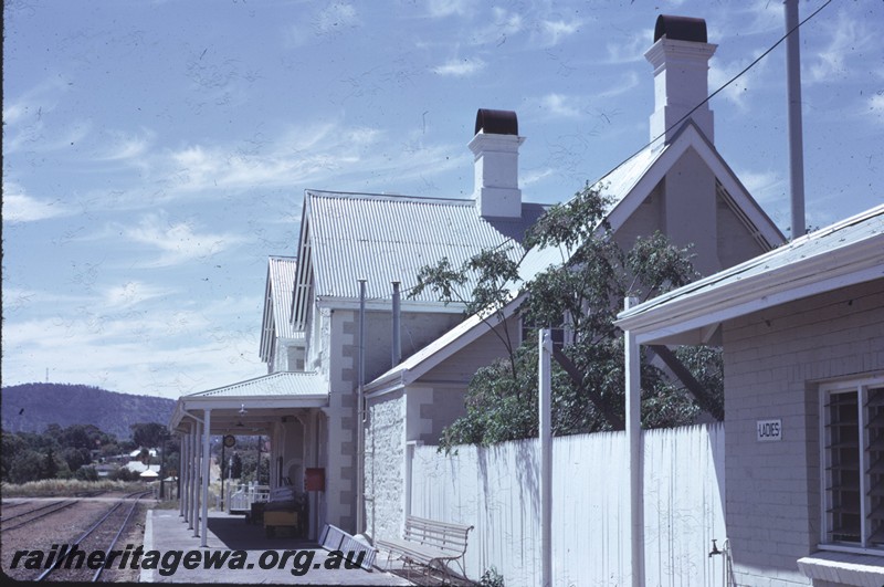 P14270
Station building, end view, passenger platform, station clock, York, GSR line.
