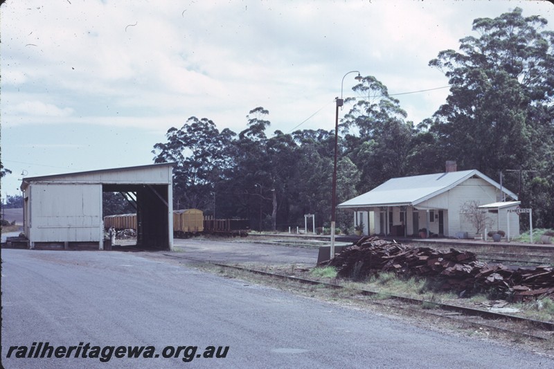 P14287
Station building, front and end view, goods shed end view, nameboard, vans and wagons in the yard, Pemberton, PP line.
