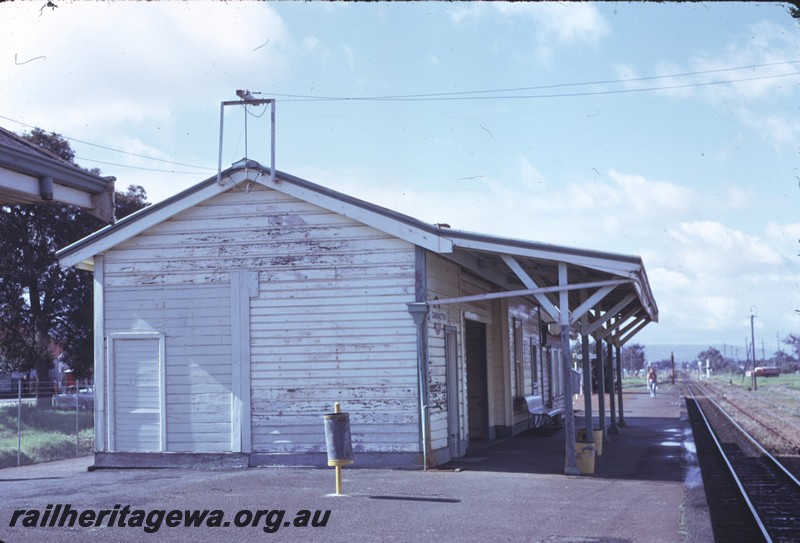 P14312
2 of 3, Station building, end and rail-side view, passenger platform, station furniture, Cannington, SWR line.
