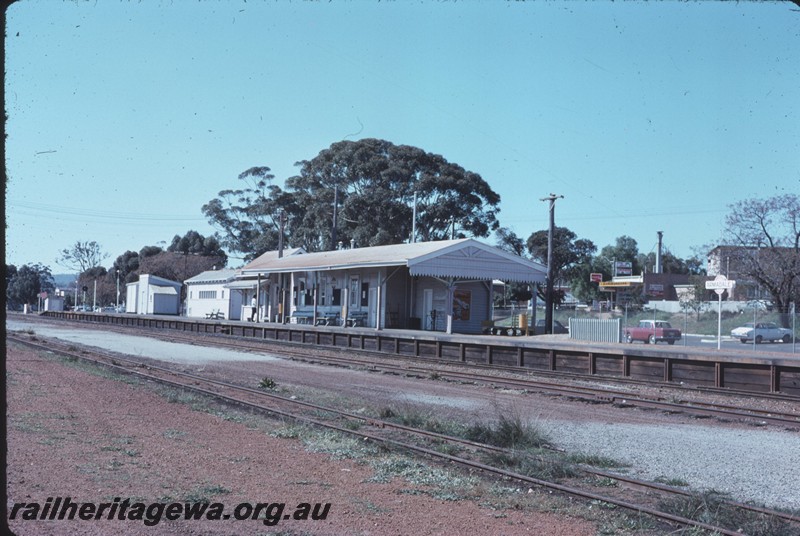 P14319
1 of 6, Station buildings, out-of shed, porter's trolley, station furniture, island passenger platform, nameboard, Armadale, SWR line.
