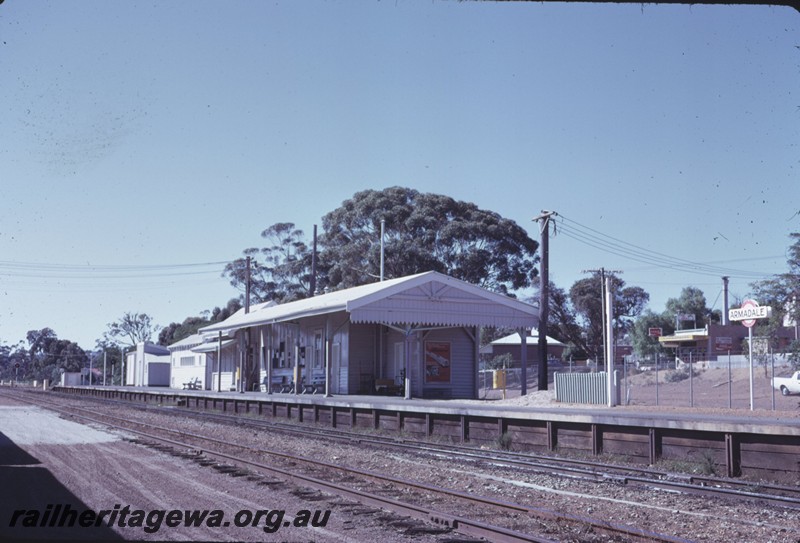 P14325
Station buildings, out-of shed, island passenger platform, station furniture, nameboard, Armadale, SWR line.
