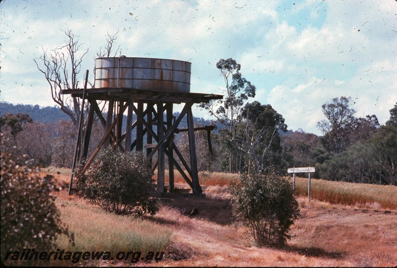 P14326
Water tower with 10,000 gallon squatters tank on 18 foot stand, water column, nameboard, Mooliaman, PN line.
