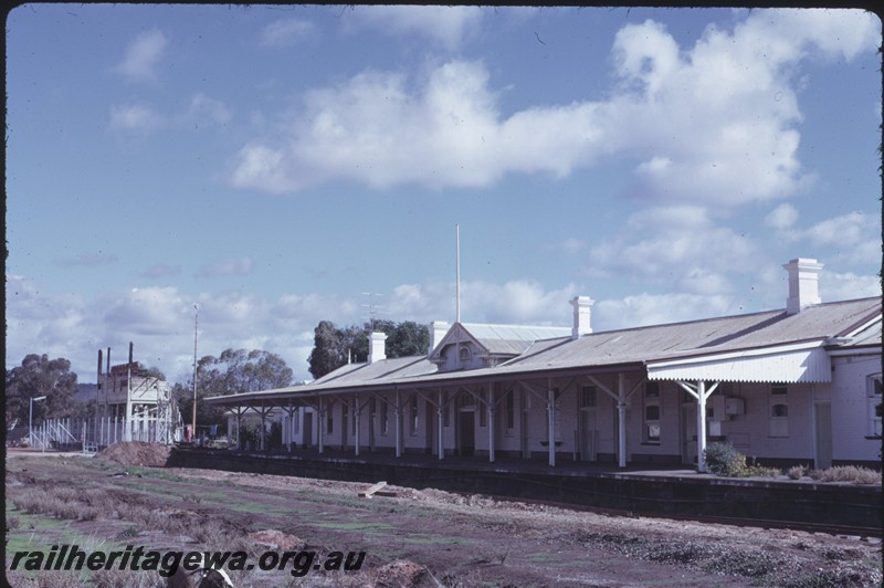 P14332
6 of 6, Abandoned station building, burnt and abandoned signal box showing exposed levers, lifted tracks, Northam, ER line.
