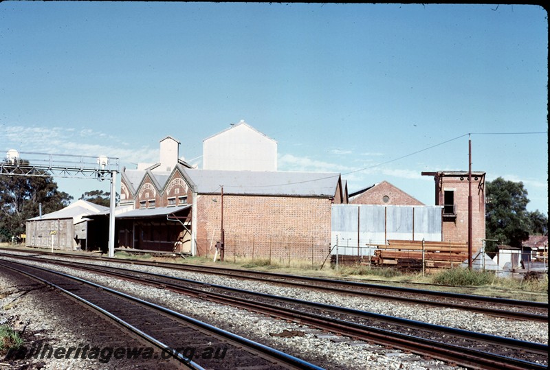 P14374
Signal gantry with searchlight signals, Peerless Flour Mill, Guildford, trackside view looking east.
