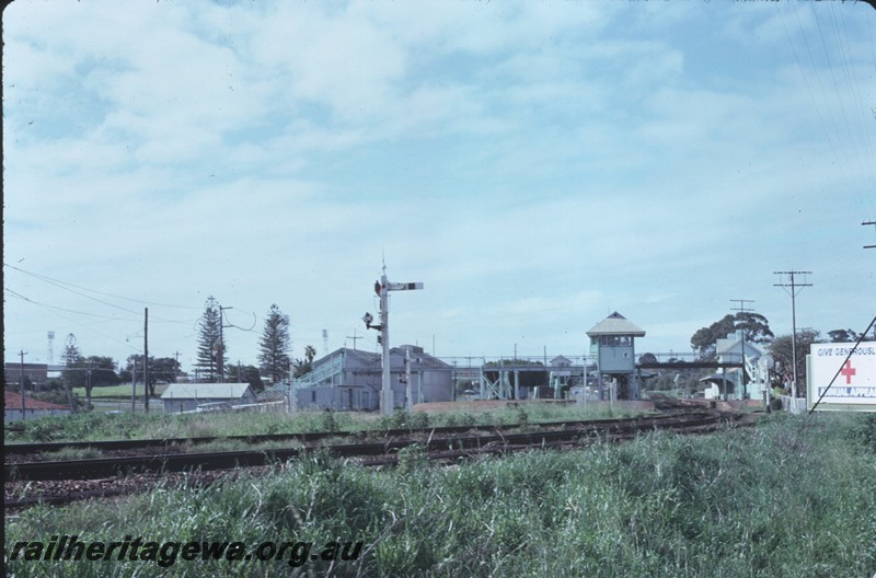 P14395
Signal box, signal, station buildings, Claremont, overall view of the station precinct looking east.
