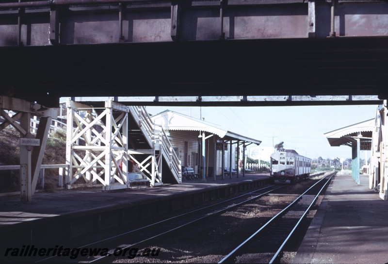 P14402
ADK/ADB class railcar set departing for Perth, station buildings, view along the platforms from under the road bridge looking east, Swanbourne, ER line
