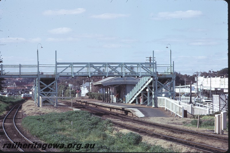 P14408
Station building, footbridge, Mosman Park, view along the tracks looking east.

