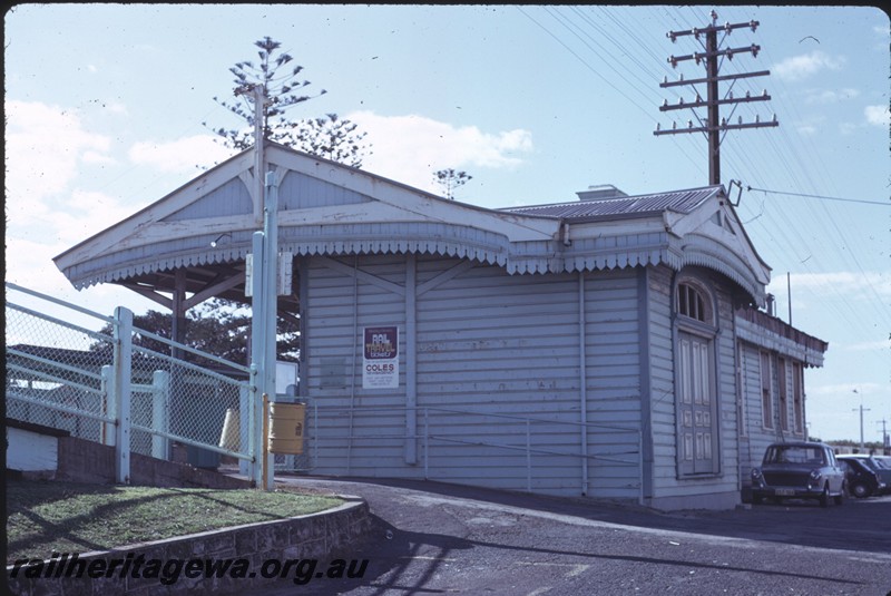 P14410
Station building, telegraph pole, Mosman Park, view of the west end and streetside entrance of the building.
