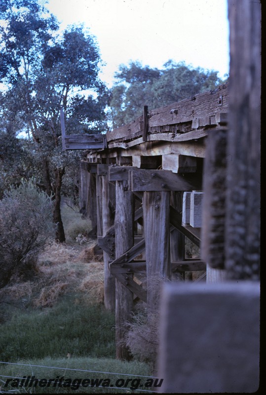P14426
Trestle bridge, Bellevue, UDRR line, view along the side of the bridge showing the refuge, abandoned and dilapidated.
