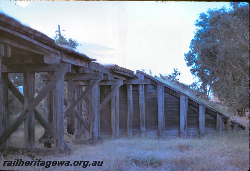 P14427
Trestle bridge, Bellevue, UDRR line, view along the side of the bridge showing the abutment, abandoned and dilapidated.
