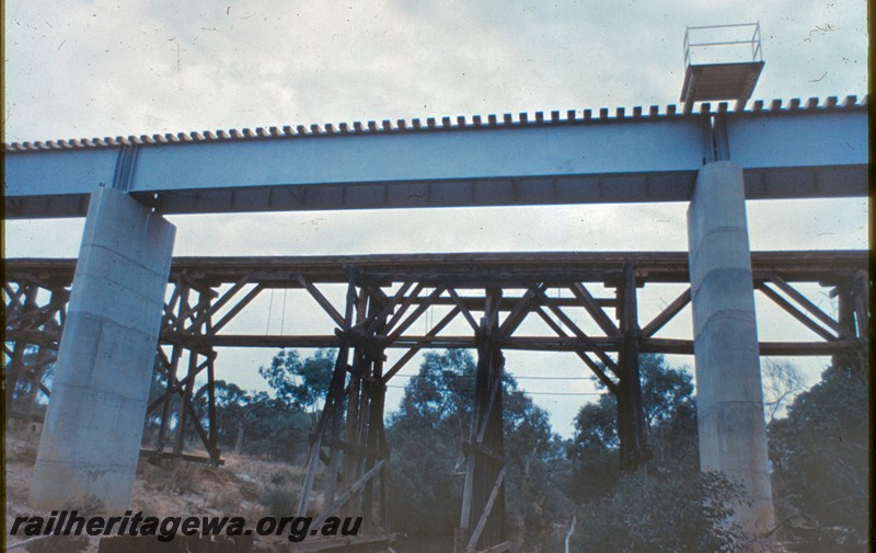 P14429
Steel girder bridge on concrete pylons, Mogumber, MR line, trestle bridge behind the girder bridge showing the centre span.
