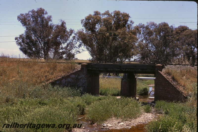 P14444
Timber bridge with brick abutments and centre pylon, between Spencers Brook and York, GSR line, side view

