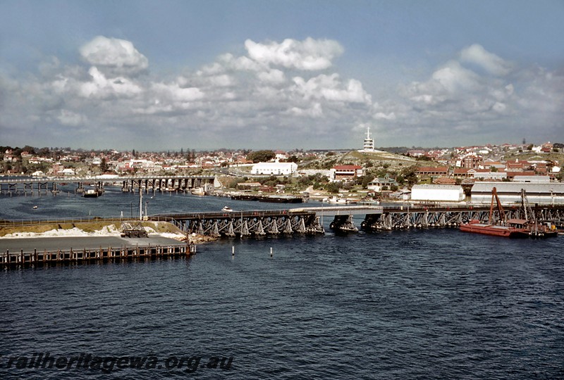 P14468
Trestle bridge with steel girder central spans, Fremantle Railway Bridge, elevated view looking east.
