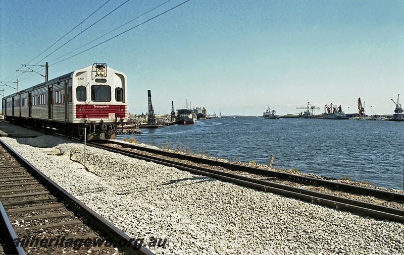 P14481
ADC class 857 on a ADC/ADL railcar set, Fremantle Rail Bridge heading north, side and front view.
