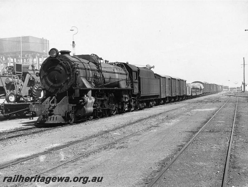 P14603
V class 1221, water tower, goose neck yard lamp, location Unknown, goods train
