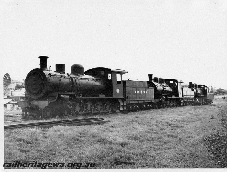 P14661
MRWA D class locos and a C class loco, awaiting scrapping, located on the beginning of the Belmont Branch, Bayswater, front and side views
