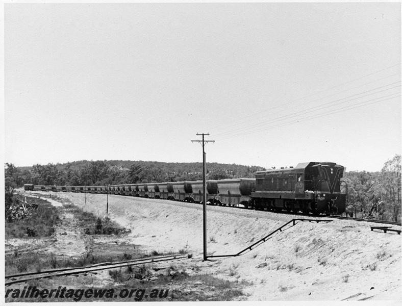 P14674
A class 1506, train of XB bauxite hoppers, telegraph pole, loaded bauxite train, heading towards Kwinana, KJ line
