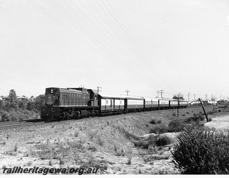 P14679
1 of 3 views of the Royal Train, hauled by long hood leading A class 1511, transporting the Queen Mother to Bunbury, SWR line

