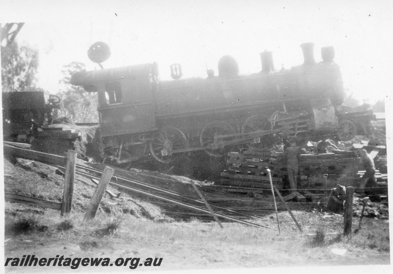 P14691
4 of 10, ES class 332  derailed on 10/6/1951, lying in a creek at Wooroloo, ER line, lifting the loco out of the creek,
