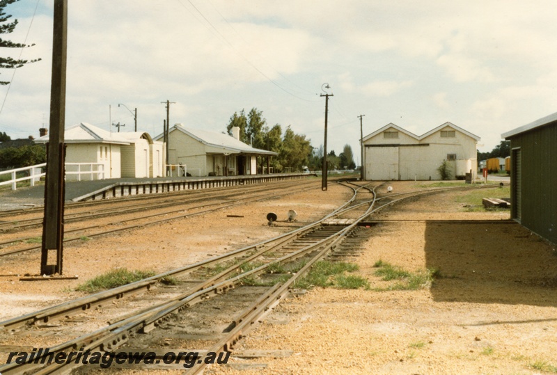 P14719
Station buildings, goods shed, passenger platform, tracks, points, cheese knobs, Busselton, BB line.
