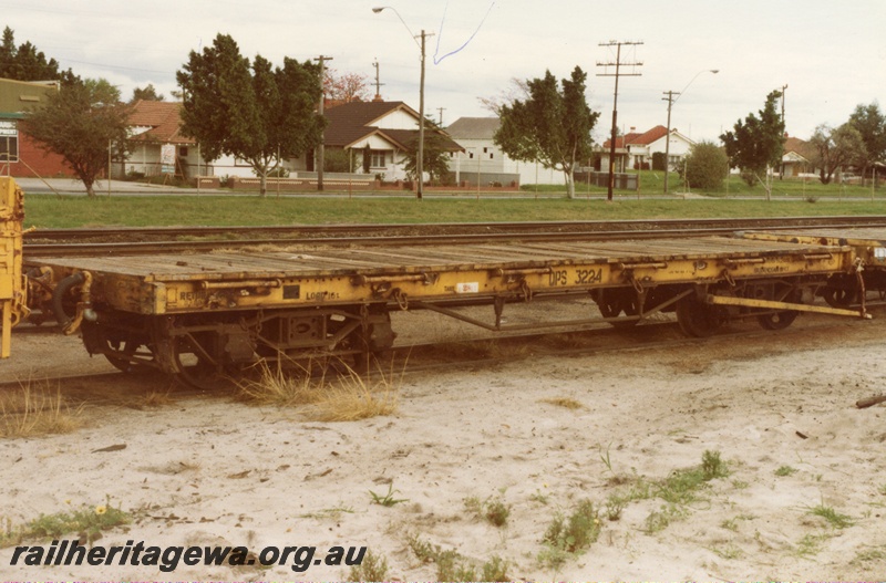 P14728
QPS class 3224 sleeper wagon in yellow livery, side view, Bassendean, ER line.
