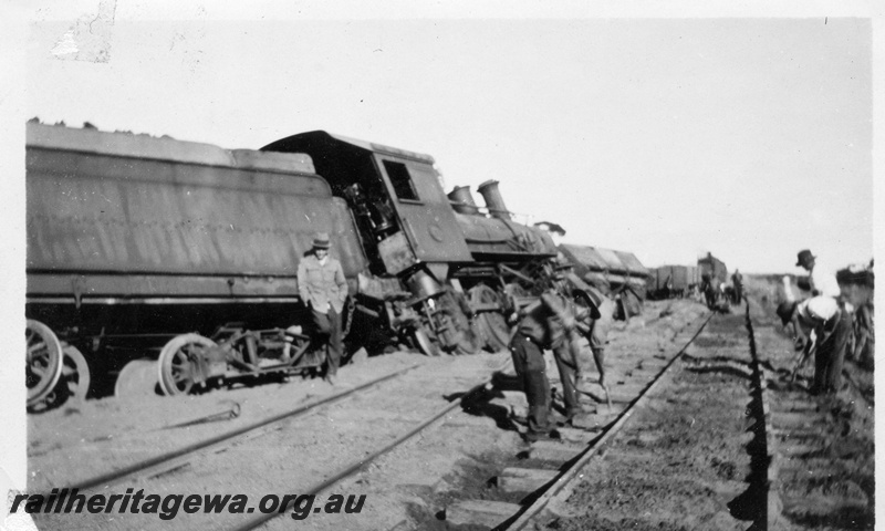 P14741
1 of 3, C class 431 steam loco on AKRU Goods No. 30 derailed near  Gabbin on  21/4/1930,  WLB line, view of the derailed train. Same as P03572.
