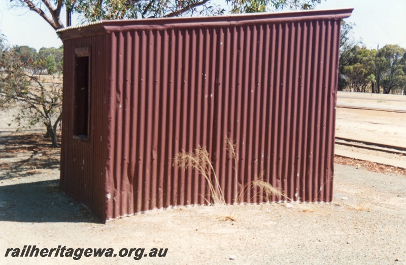 P14745
2 of 6 images of the station precinct and buildings at Tambellup, GSR line, shed located on the platform, side and rear view
