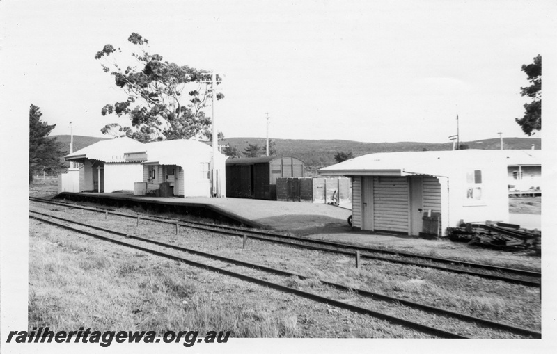 P14778
1 of 6 images of the station precinct and buildings at Elleker, c 1970, view along the platform looking east showing the buildings on the platform
