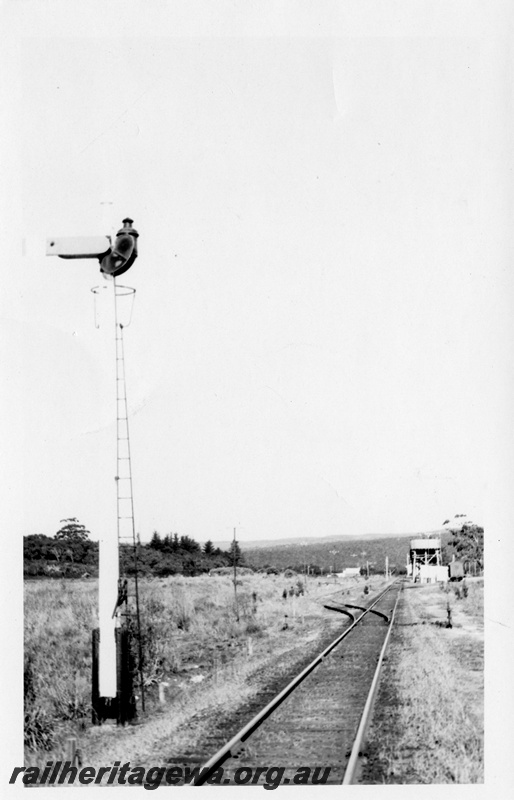 P14780
3 of 6 images of the station precinct and buildings at Elleker, c1970, signal, water towers in the background.
