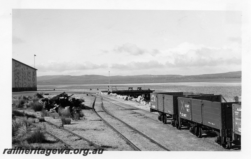 P14785
2 of 4 images of the railway infrastructure at the wharf at Albany, blue cross wagons on the approach track to the wharf including GC class 8407 incorrectly stencilled 