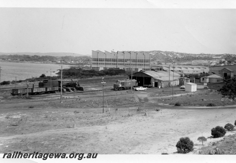 P14791
V class loco, X class loco, water column, loco shed, loco depot, Albany, GSR line elevated overall view of the depot. c1969
