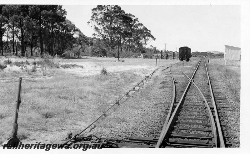 P14792
1 of 2 images of the siding at Cuthbert, GSR line, DC class van, stockyard, platform shed, view looking along the siding.
