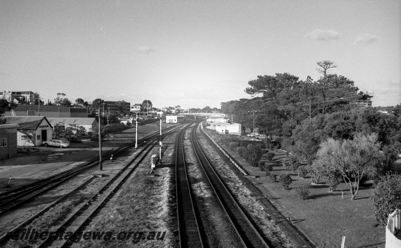 P14820
17 of 21 images of the railway precinct and station buildings at Subiaco, c1969, track, signals, overall elevated view of the yard looking east
