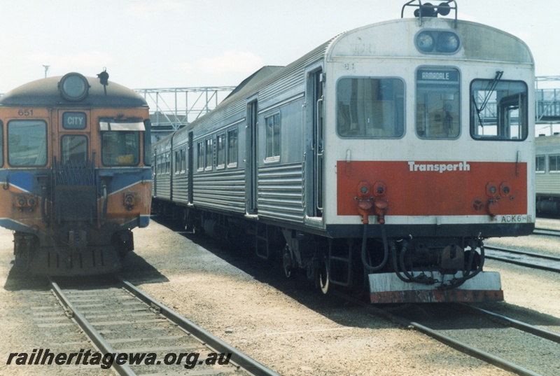 P14839
ADG/V class 651 diesel railcar in Westrail orange livery, front view, and ADK class 681 diesel railcar, Claisebrook Railcar depot, side and end view.
