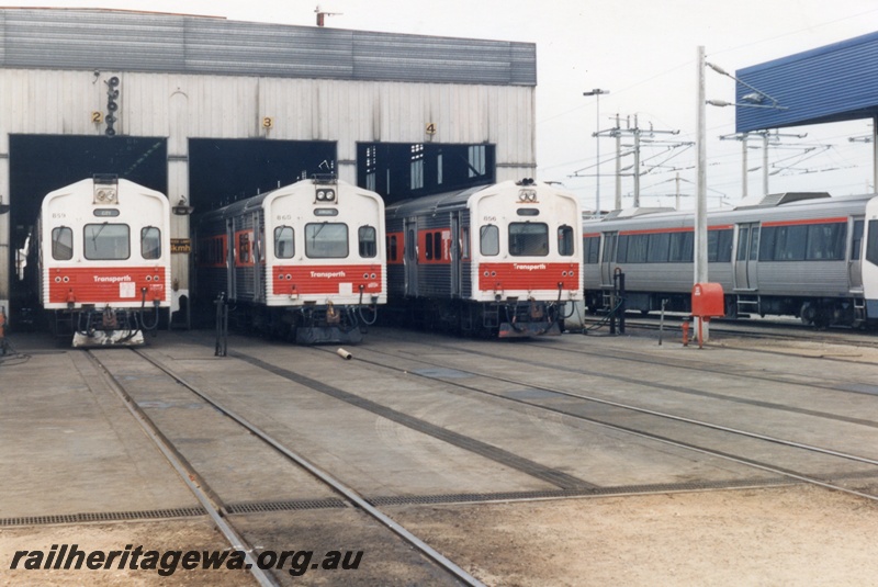 P14841
ADC class 859, 860 and 856 diesel railcar trailer cars in Claisebrook railcar depot shed, end view, Claisebrook.
