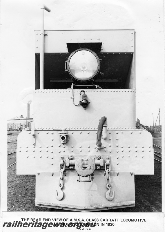 P14888
MSA class Garratt articulated steam locomotive, in photographic grey livery, end view, Midland Junction, ER line.
