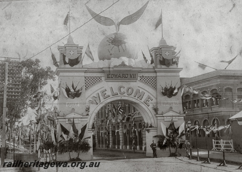 P14993
A highly decorative archway constructed in the forecourt of Perth Station to welcome to Western Australia the Duke and Duchess of York 
